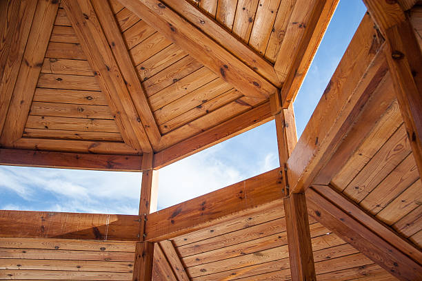 istock Wooden housing construction - top part 488783815