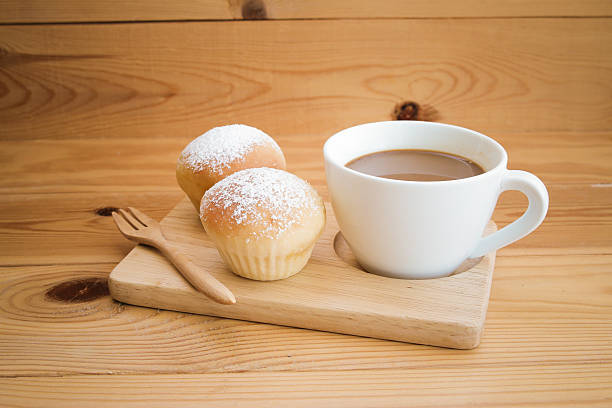 istock Morning set of Icing sugar buns and coffee. 488784050