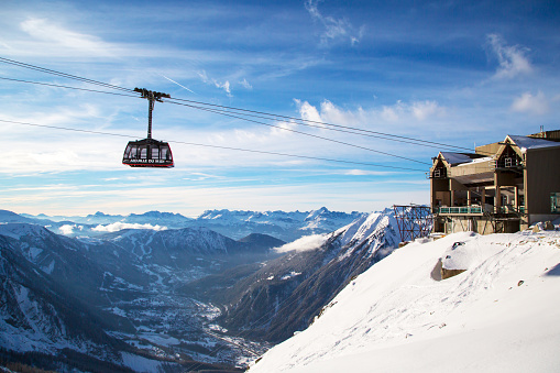 Chamonix, France - January , 28, 2015: Cable Car from Chamonix to the summit of the Aiguille du Midi  and lift station high in the mountains Chamonix, France.