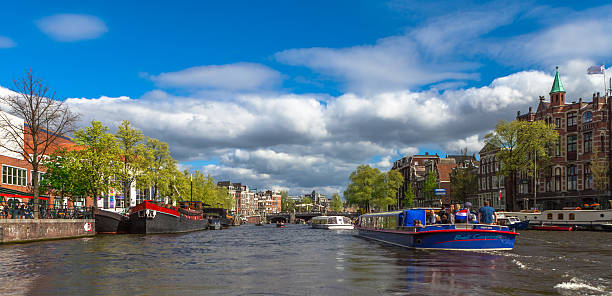 istock Boats on Amsterdam Canal 488786323