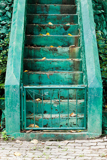 istock sement stairs with green line for separated up or down 488786835