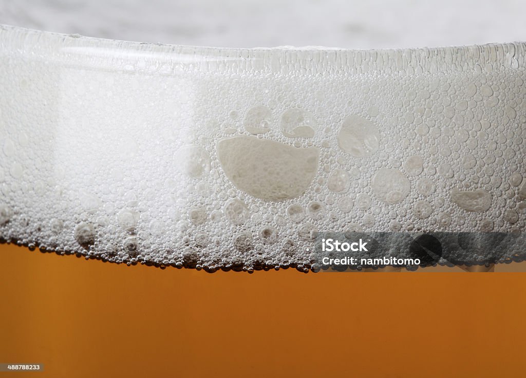 Beer bubbles in the high magnification and close-up. Abstract Stock Photo