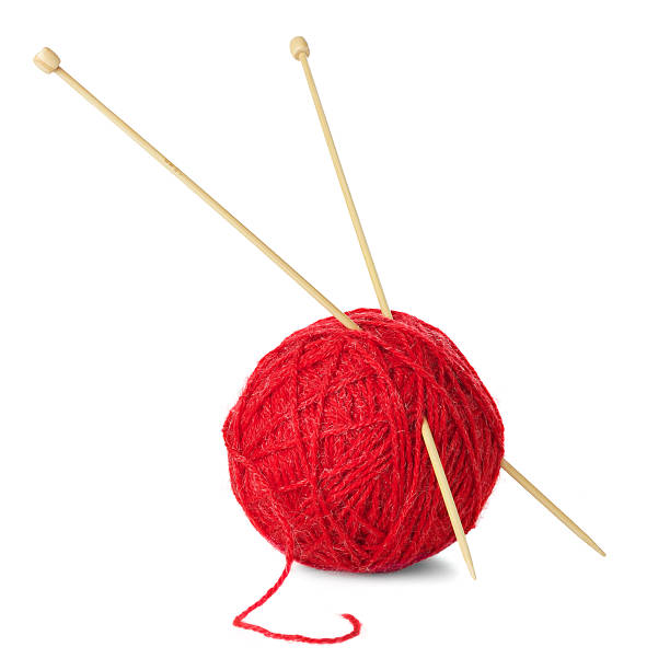 istock Red ball of wool and knitting needles 488788589
