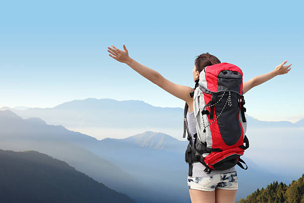 istock happy woman mountain hiker 488789889