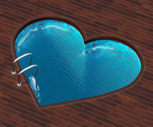 la piscina en forma de corazón - backwash fotografías e imágenes de stock