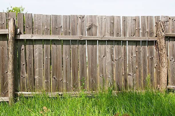 istock Classic aged wooden fence as a background texture 488792730