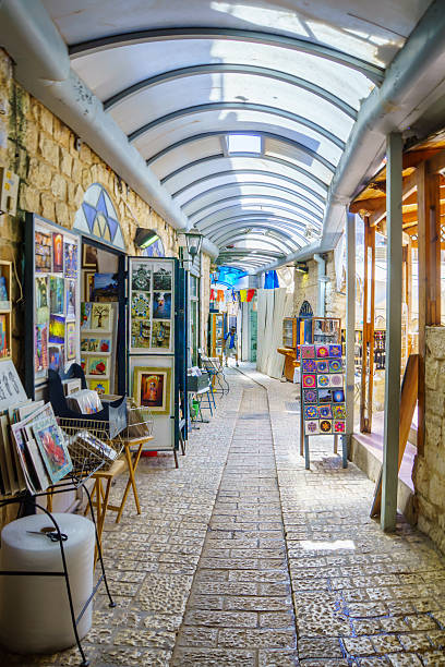 Safed, Israel - September 18, 2015: An ally in the Jewish quarter, with local galleries and other businesses, locals and tourists, in Safed, Israel