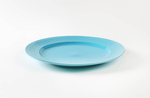 istock Turquoise dinner plate with wide rim 488794788
