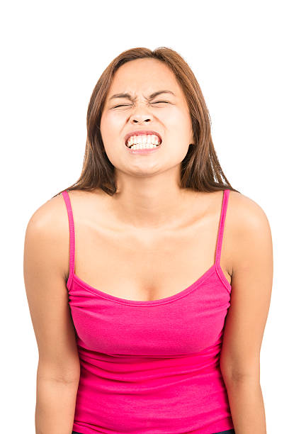 istock Temper Tantrum Young Asian Woman Grimace Gritting 488795420