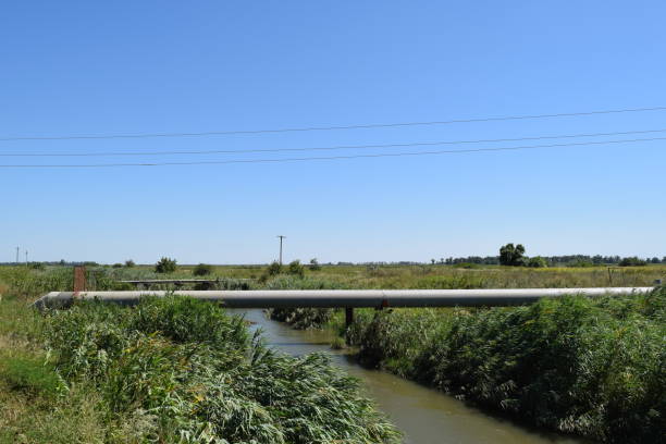 istock The gas pipeline through the small river 488796982