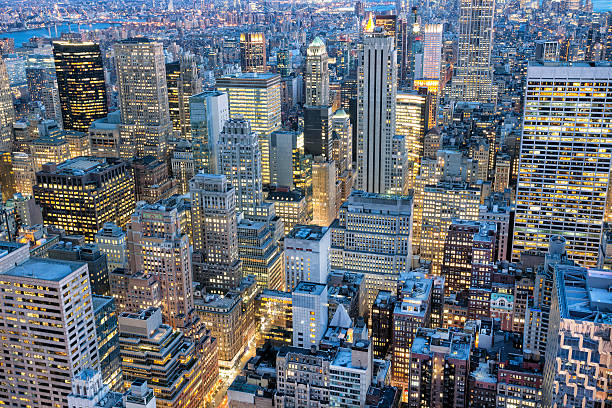 istock New York Skyscrapers Illuminated at Dusk 488798624
