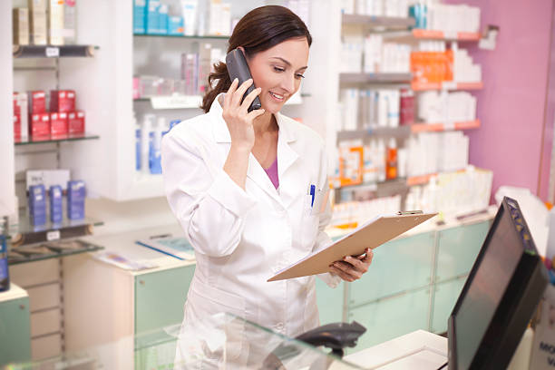 istock Receive patient call in drugstore 488803705