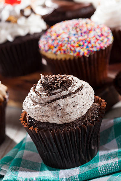 istock Assorted Fancy Gourmet Cupcakes with Frosting 488803929