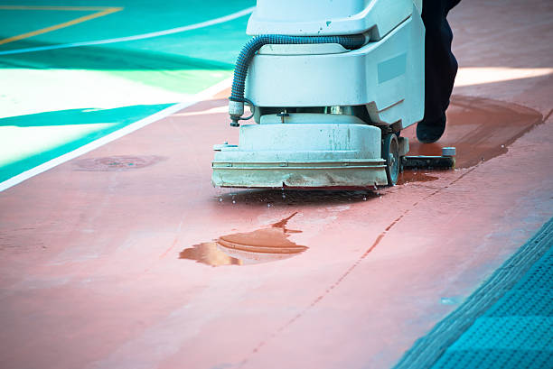 istock Person Cleaning Sports Field 488804067