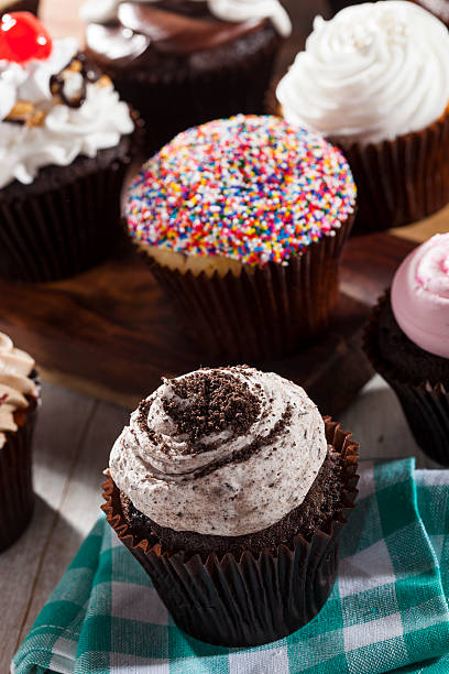 istock Assorted Fancy Gourmet Cupcakes with Frosting 488805721