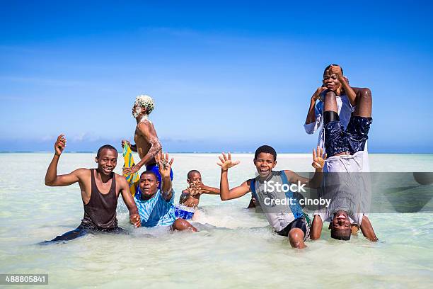 Young Group Of Men On Beach Of Zanzibar Stock Photo - Download Image Now - Activity, Adolescence, Adult