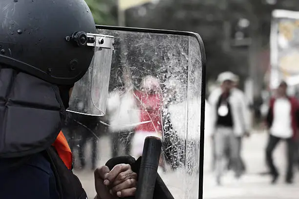 Riot Police Watching the Protester in Thailand.