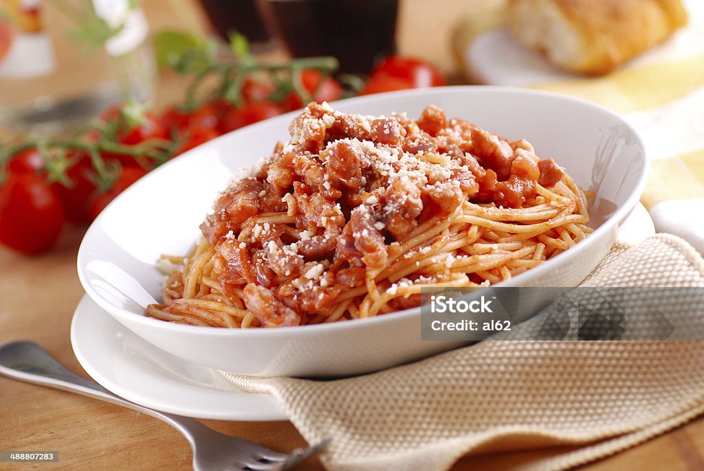 Spaghetti Amatriciana in the white plate Spaghetti Amatriciana, traditional Italian recipe Amatriciana Stock Photo