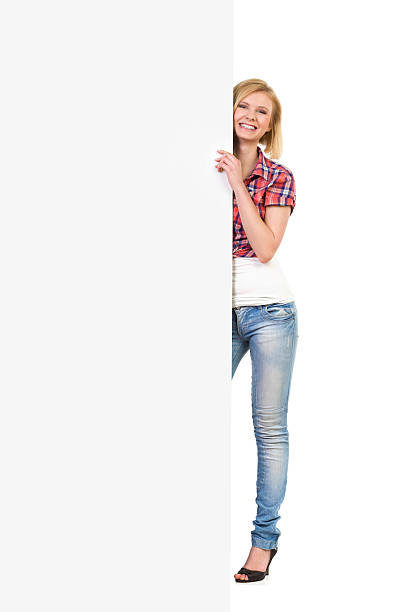 istock Happy woman behind a white banner 488808101