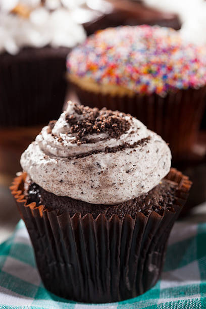istock Assorted Fancy Gourmet Cupcakes with Frosting 488808111