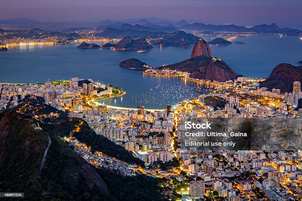 Spectacular aerial view over Rio de Janeiro Spectacular aerial view over Rio de Janeiro as viewed from Corcovado. The famous Sugar Loaf mountain sticks out of Guanabara Bay Rio de Janeiro Stock Photo