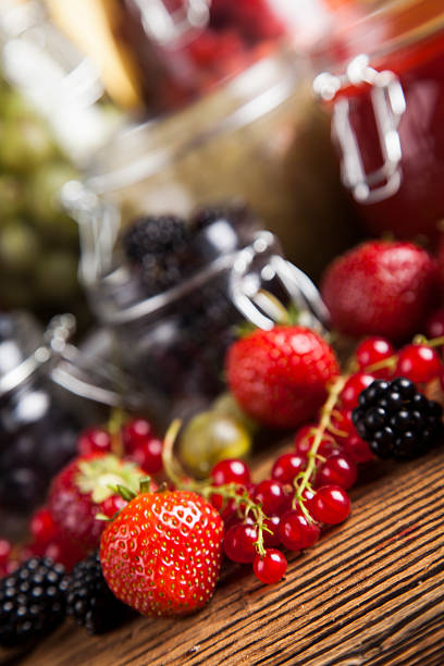 istock Fresh berries and wild berry jam 488813554