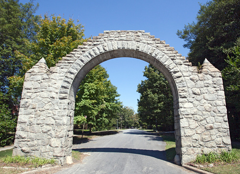Stone Arch over residenttial street. Horizontal.
