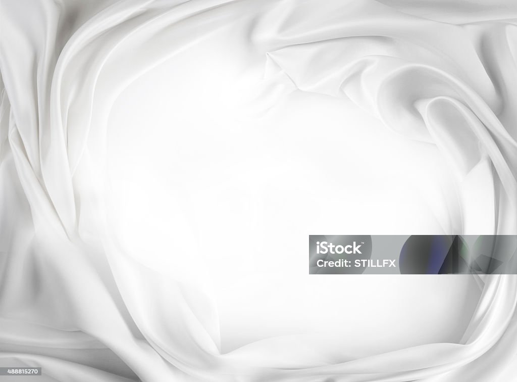 White silk Closeup of rippled white silk fabric. Advertising copy space 2015 Stock Photo