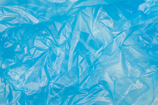 gestell aus blauem kunststoff-tasche struktur - garbage bag garbage bag plastic stock-fotos und bilder