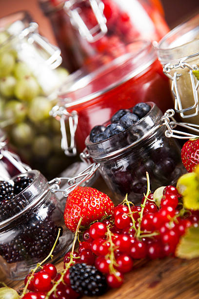 istock Fresh berries and wild berry jam 488817772