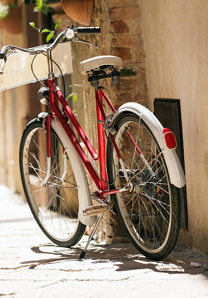 istock Red Bicycle in an alley 488819096