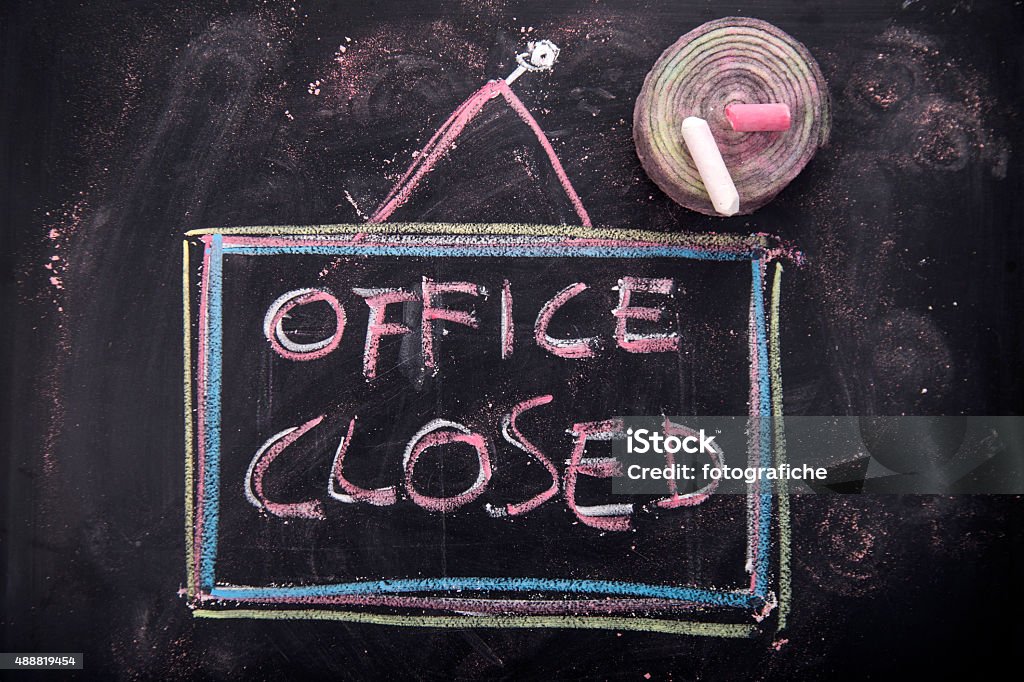 Office closed Graphic representation of the word, office closed, written with chalk on blackboardGraphic representation of the word, office closed, written with chalk on blackboard 2015 Stock Photo