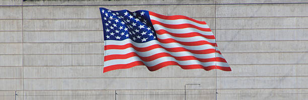 istock The American flag on a large concrete wall 488821272