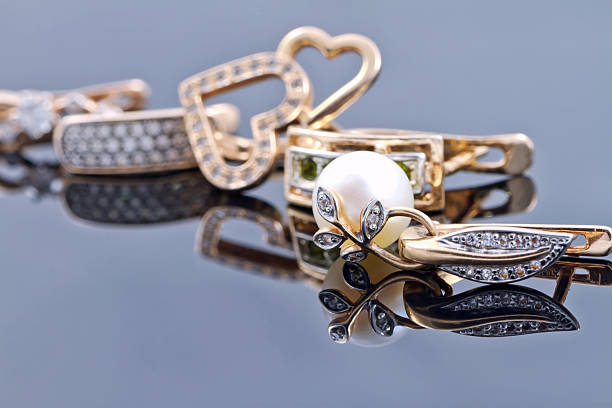 istock Gold earrings in different years and in different versions 488825392
