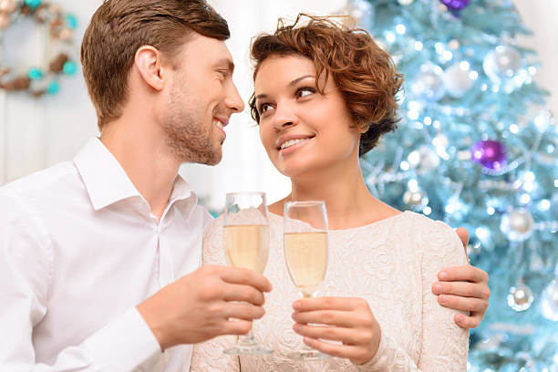 istock Loving couple drinking champagne 488825638