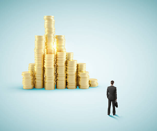 istock businessman and  coin city 488825992