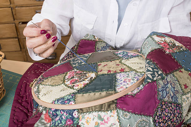 istock Mature woman by sewing and quilting 488826369