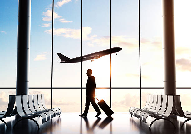 istock businessman in airport 488826562