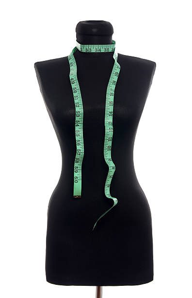 istock Tailor mannequin with measuring tape isolated 488827017