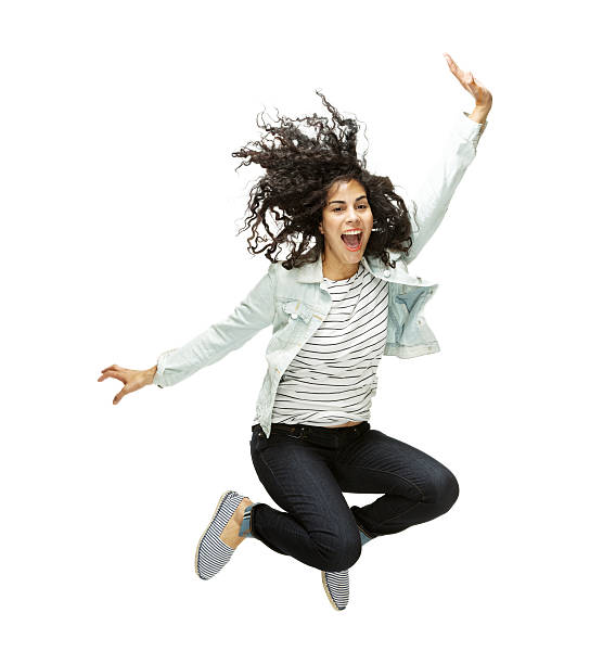 istock Happy young woman jumping 488827767