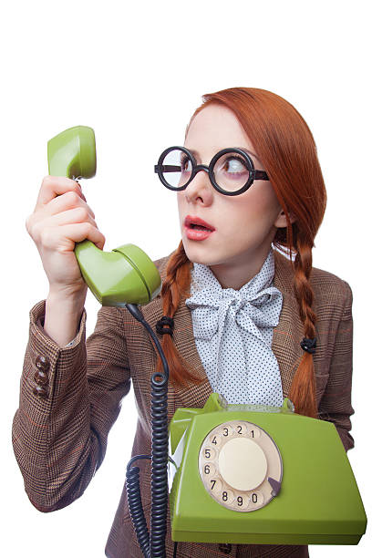 istock Teacher with green retro phone 488827859