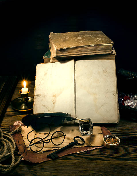 istock old papers and books on a wooden table 488828617