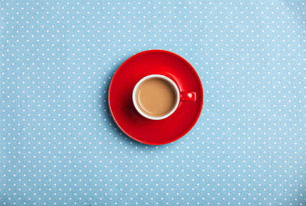 cup of coffee on speckled background. stock photo