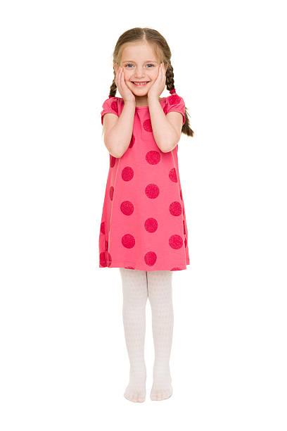 istock girl in a red dress. studio shot 488830043