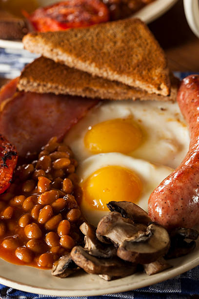 istock Traditional Full English Breakfast with Eggs, Bacon, and Baked Beans 488832643