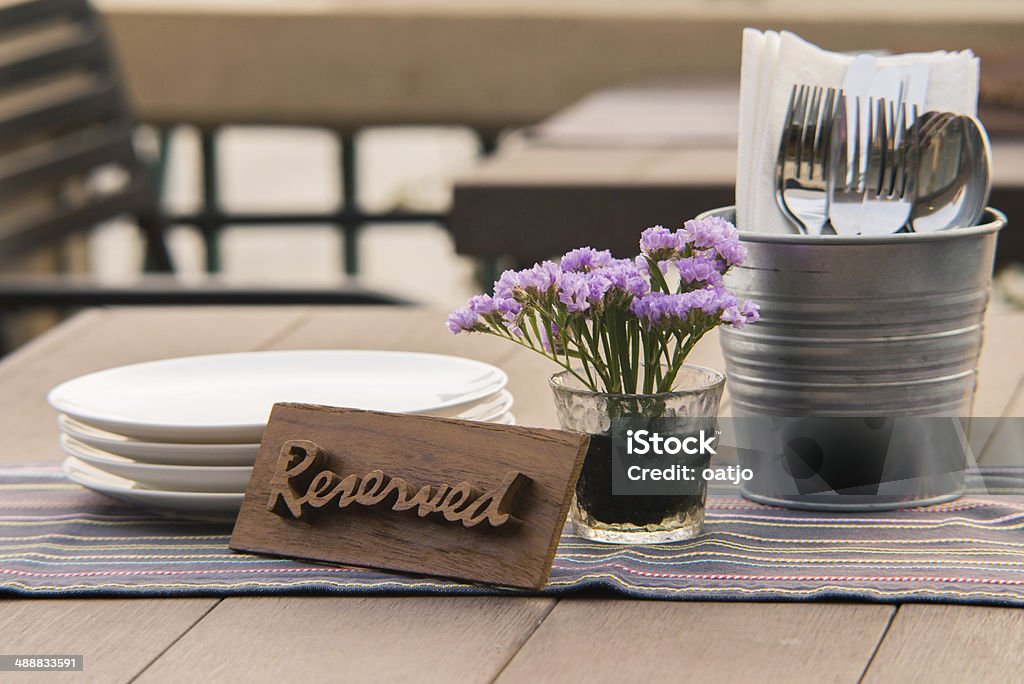 Reserved sign on a restaurant table Restaurant Stock Photo