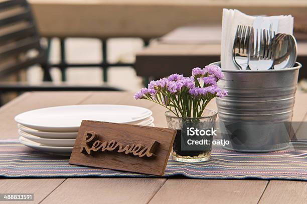 Reserved Sign On A Restaurant Table Stock Photo - Download Image Now - Restaurant, Bucket, Reserved Sign