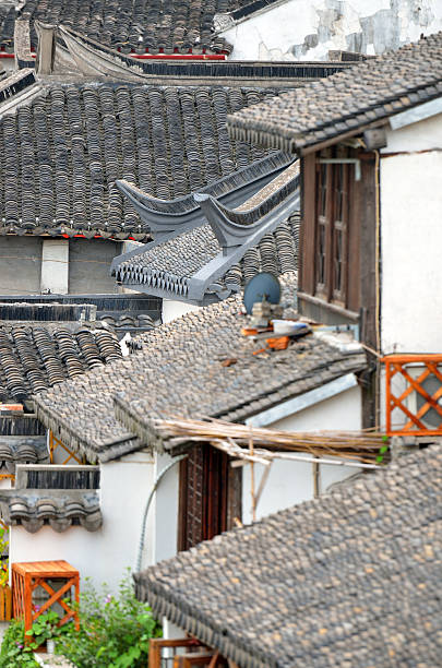 istock Old village by river in Shanghai with boat 488836338
