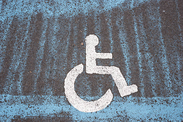 istock only handicapped parking sign on the asphalt ground 488839576