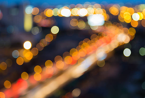 istock Defocused city road curved, at night 488840328